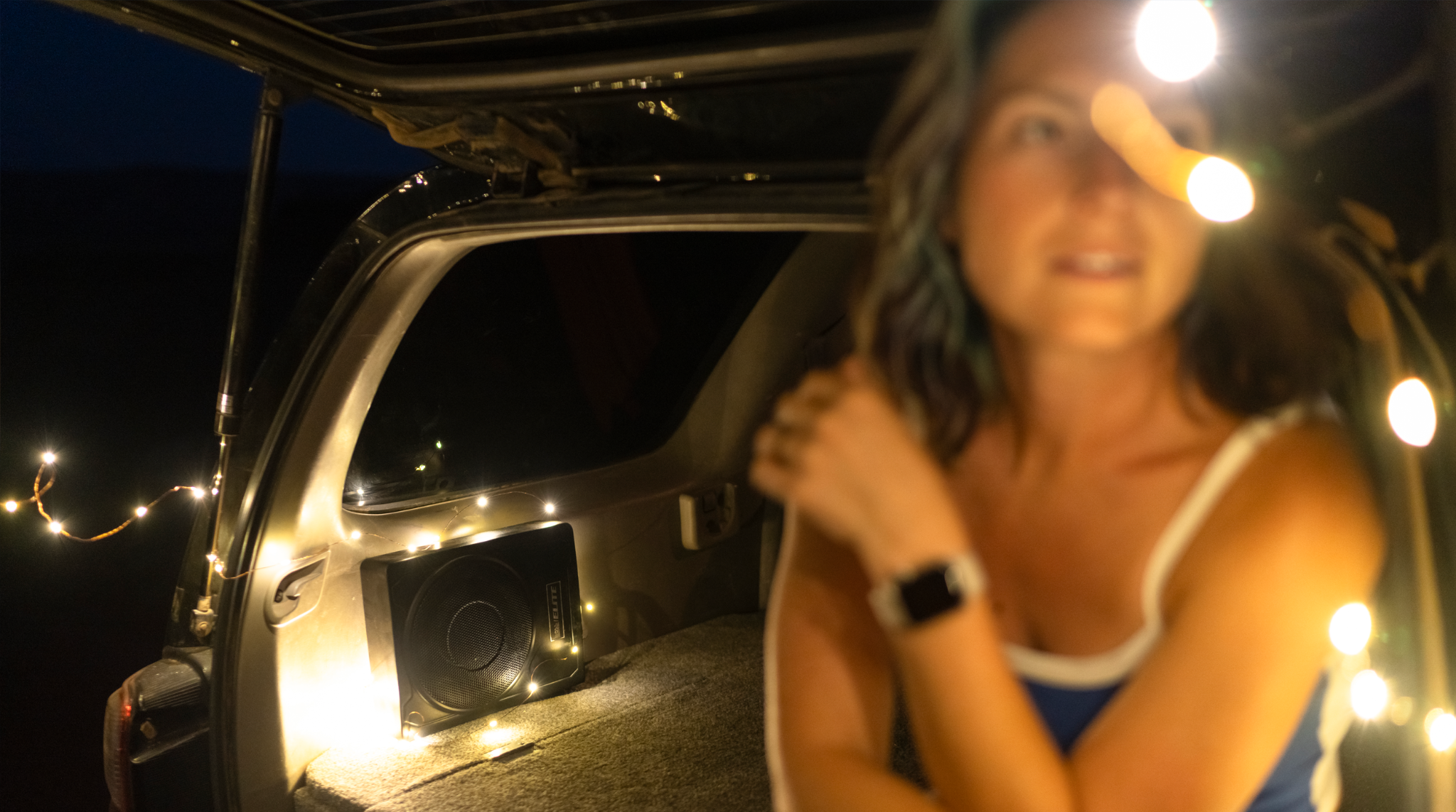 BOSS Audio system in a car at night
