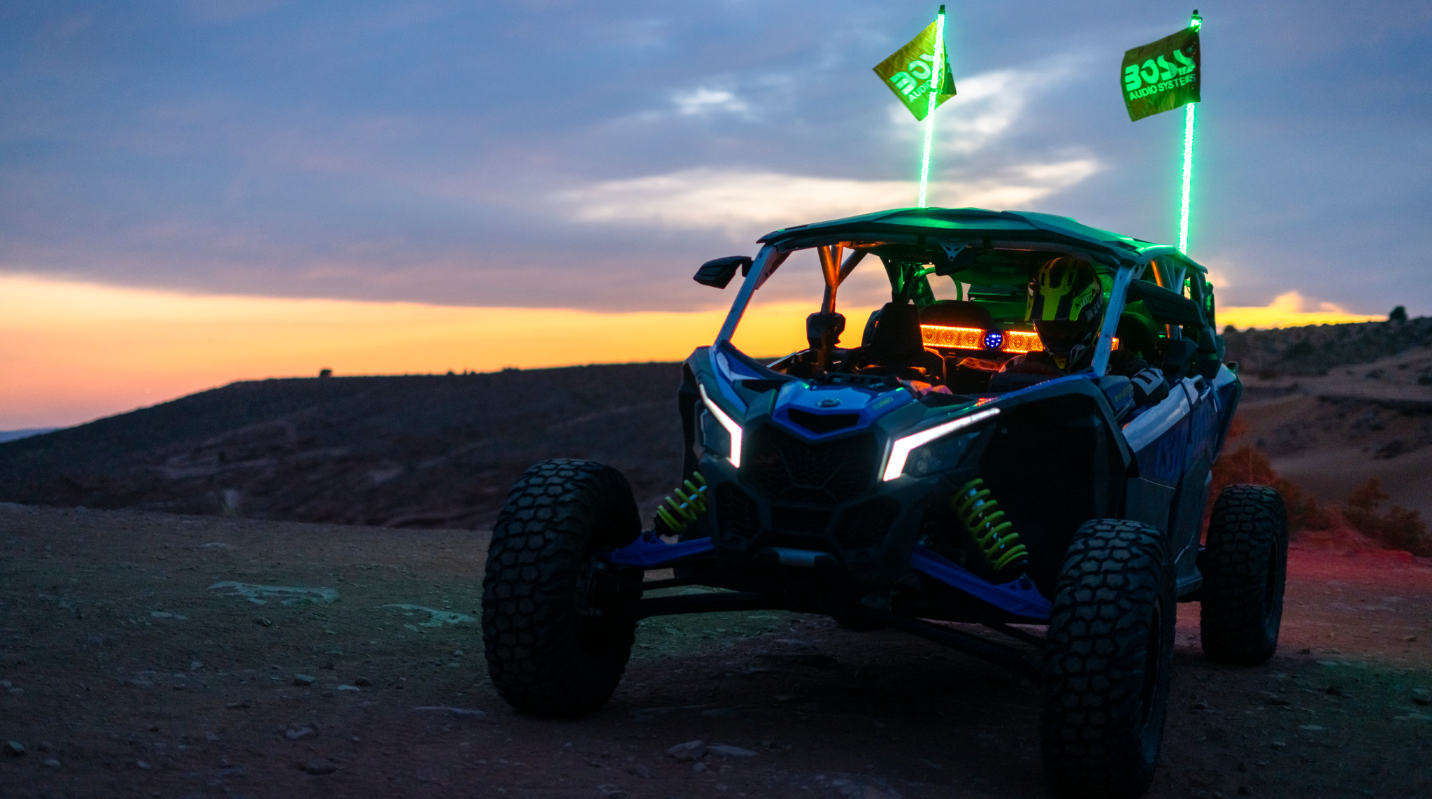 BOSS Audio off-road vehicle at sunset